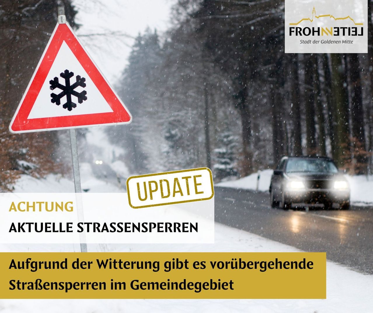 A road sign warns of snow and ice on the road. The sign is red and white with a snowflake symbol. A car drives down the road with its headlights on. The road is snowy, and there are trees and a logo on the right.