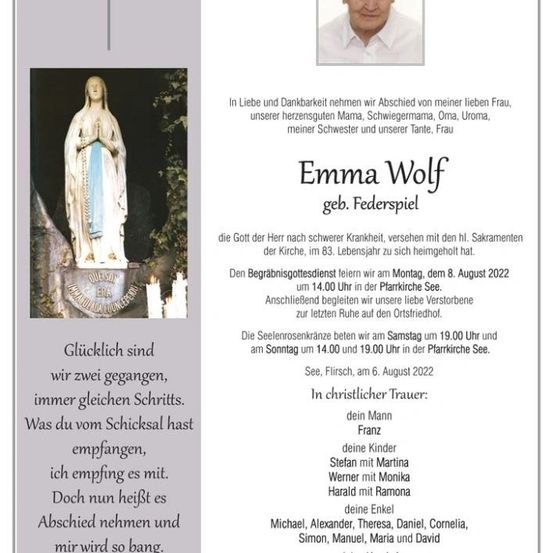 Ein Todesanzeige für Emma Wolf mit einem Foto von ihr, einer Statue von Maria und einem Gedicht. Der Text ist auf Deutsch und enthält Details über ihre Beerdigung und Gedenkfeiern.