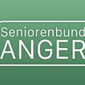 Das Logo für Seniorenbund ANGER, mit einem weißen Drachen auf grünem Hintergrund und einem roten Emblem eines Baums mit Herzen.