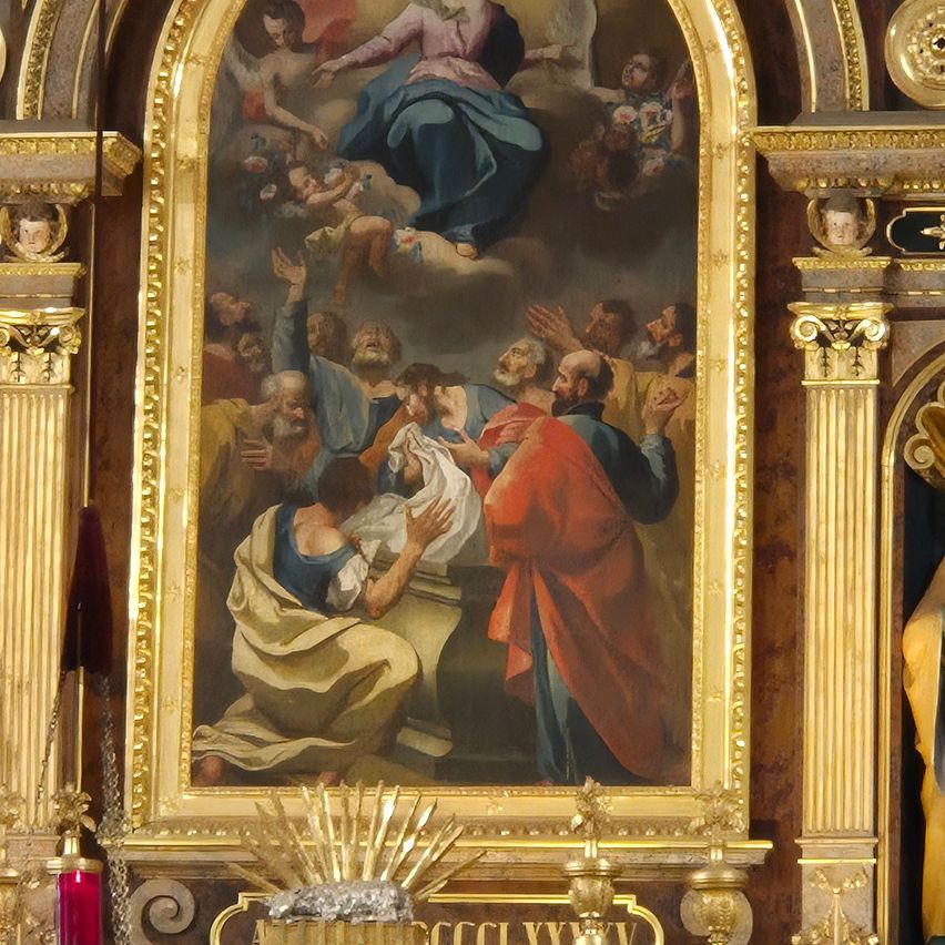 A framed painting depicting a religious scene with figures in ancient attire, a central figure in blue and red robes, and a golden frame with intricate designs.