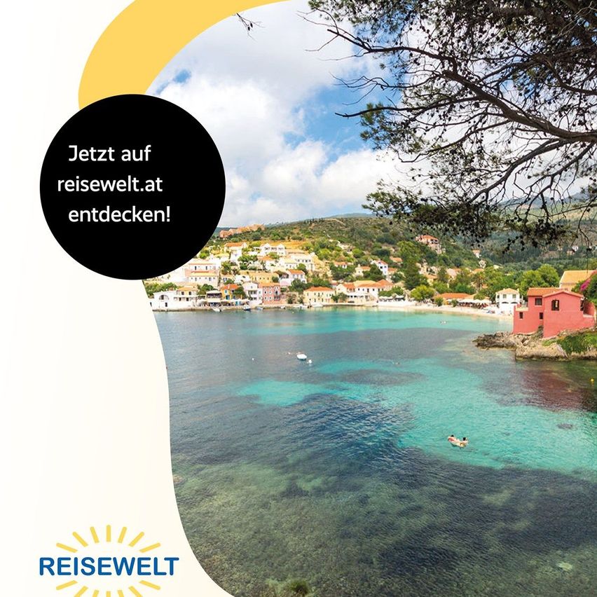 Luftaufnahme eines Küstendorfs mit kristallklarem Wasser, einladend zum Entdecken. Besuchen Sie jetzt reisewelt.at.