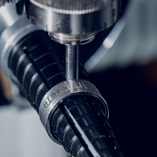 Bild enthält, Machine, Screw