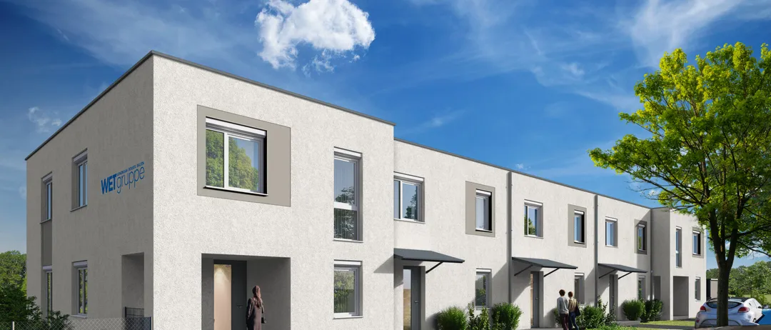 Eine künstlerische Darstellung eines modernen Apartmentgebäudes mit einer Frau, die den Eingang betritt. Das Gebäude hat mehrere Fenster und ist von Grün umgeben.