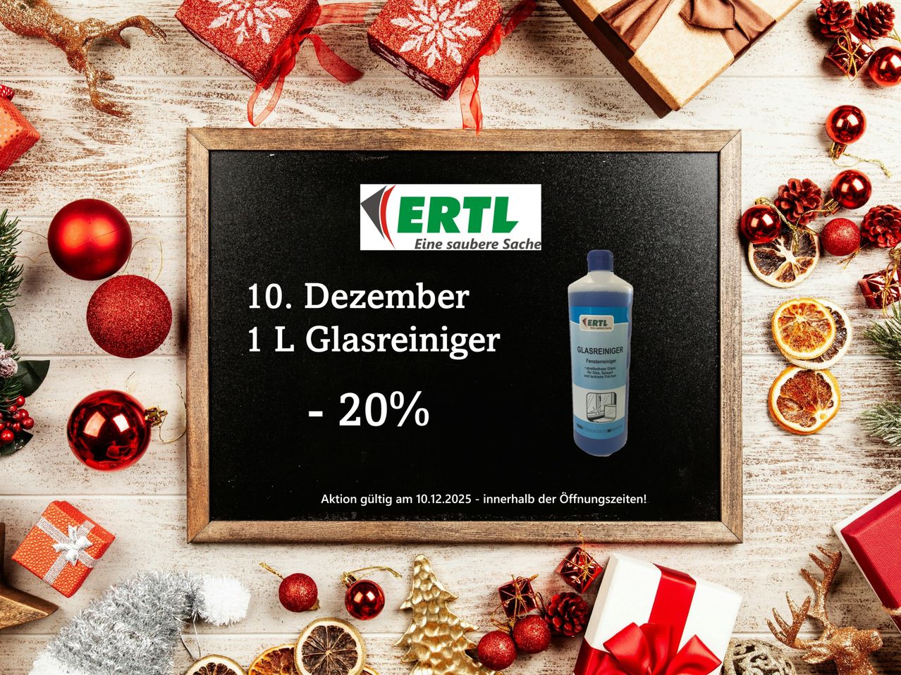 A blackboard displays a sale advertisement for a 1L bottle of glass cleaner by Ertl. The sale offers a 20% discount on the cleaner. The promotion is valid on December 10, 2025, during store opening hours. Surrounding the blackboard are Christmas decorations and gifts.