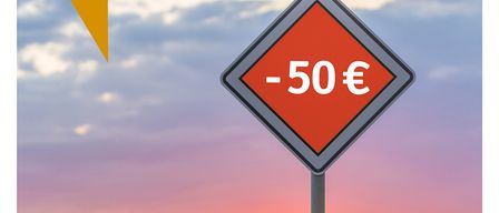 A road sign indicates a 50 euro reduction, with an orange speech bubble containing the word Abendstunde, and a sunset in the background.