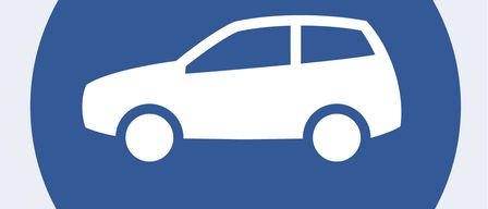 Blue circle sign with a car icon and the text 'PKW' inside. The icon represents a vehicle.