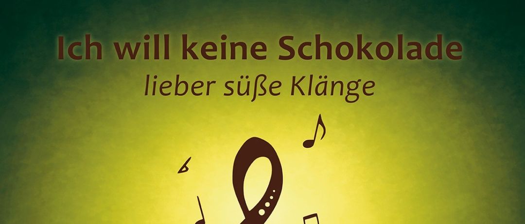 Plakat mit Händen, die eine Violinschlüssel und Musiknoten halten. Veranstaltung: MGV und Gem. Chor Maria Rojach am 29. Mai 2026 um 19:30 Uhr im Kulturstadl Maria Rojach.