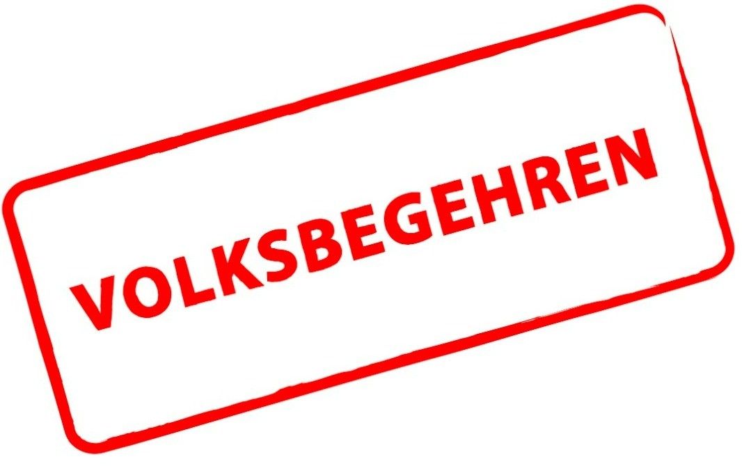Ein roter Stempel auf weißem Hintergrund mit dem Text 'VOLKSBEGEHREN' in roten Buchstaben geschrieben. Das Wort 'VOLKSBEGEHREN' ist in Großbuchstaben geschrieben.