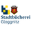 Das Logo der Stadtbuecherei Glognitz zeigt ein blaues und gelbes Quadrat mit einer Glocke, umgeben von einem roten und goldenen Schild.