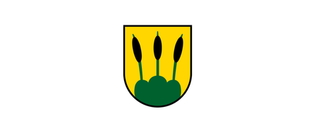 Ein gelber Schild mit drei grünen Schilfrohren und einem grünen Blatt in der Mitte.