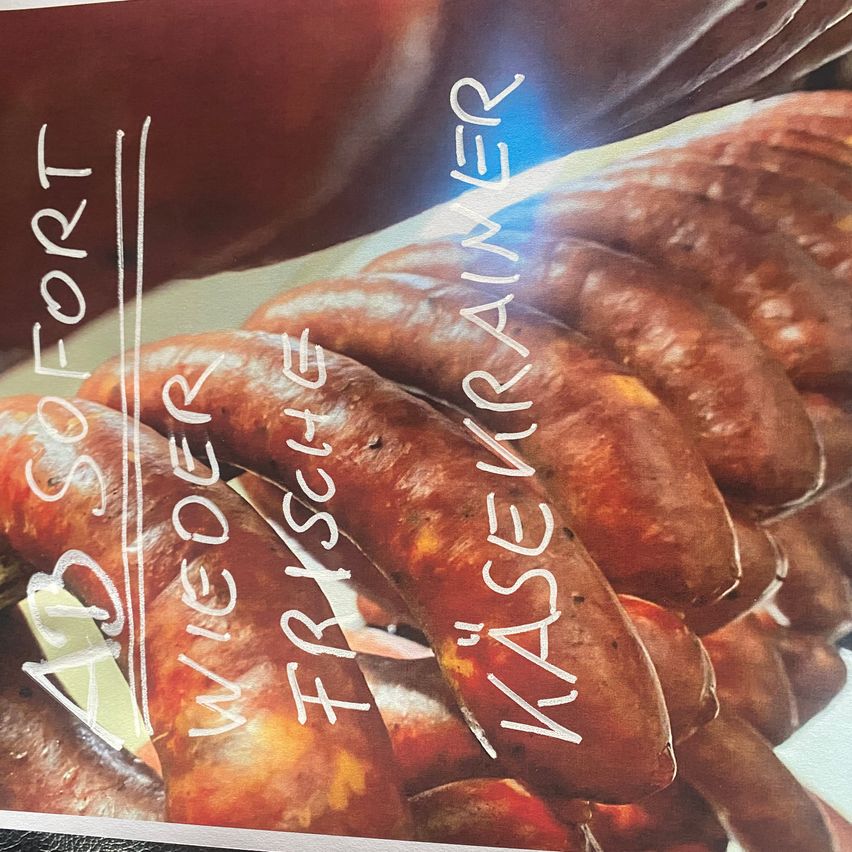 A close-up view of sausages labeled 'Wieder Frissage' with a watermark of 'AD SOFT' on the left side.