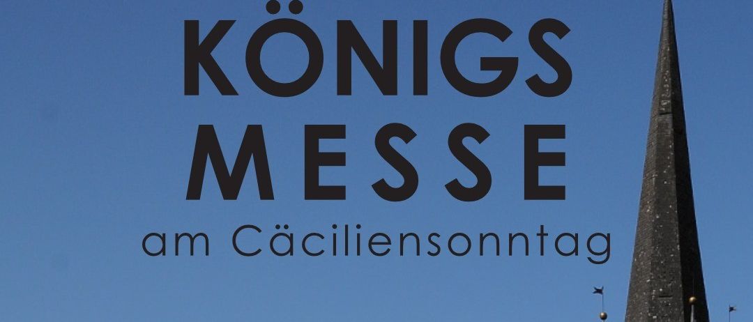 Plakat für die Christ Königs Messe am 23. November 2025 um 10:00 Uhr in der Pfarrkirche Klaus. Das Plakat zeigt einen Kirchturm und eine Uhr auf der Kirche.