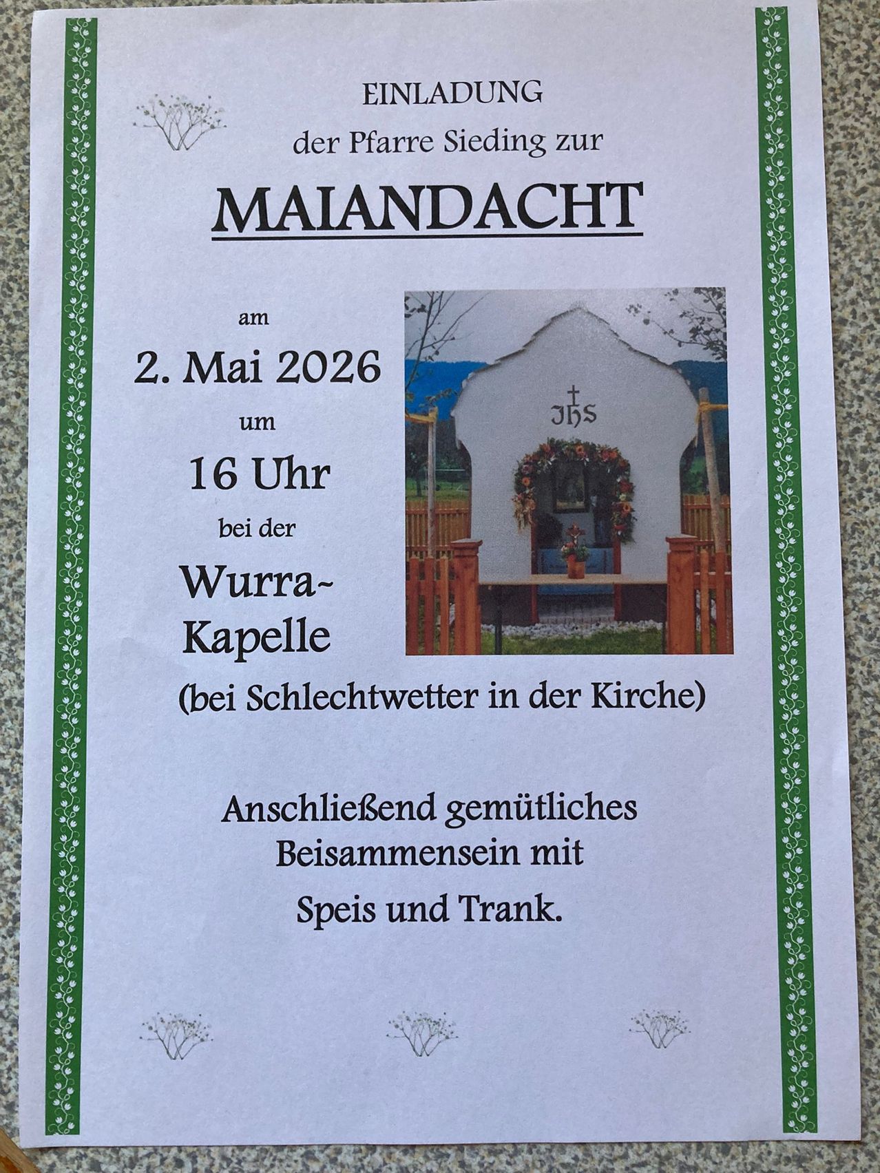 Poster for Maiandacht on May 2, 2026 at 4 PM at the Wura Chapel (near Schlechwetter in the Church). A friendly gathering with food and drink follows.