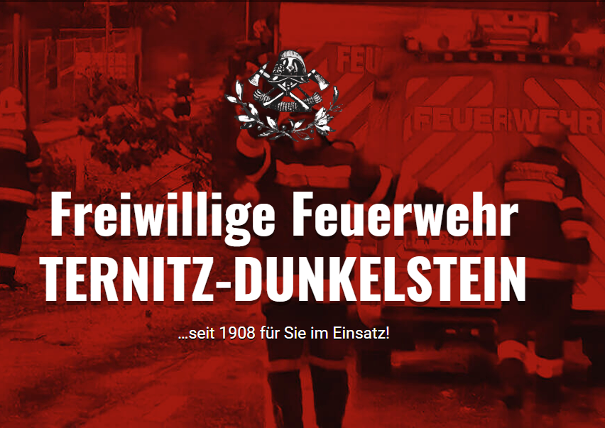 Ein rotes Plakat mit dem Text Freiwillige Feuerwehr Ternitz-Dunkelstein. Das Plakat hat ein Logo eines Feuerwehrmanns. Der Feuerwehrmann trägt einen Helm und einen Feuerlöscher. Das Plakat hat einen roten Hintergrund.