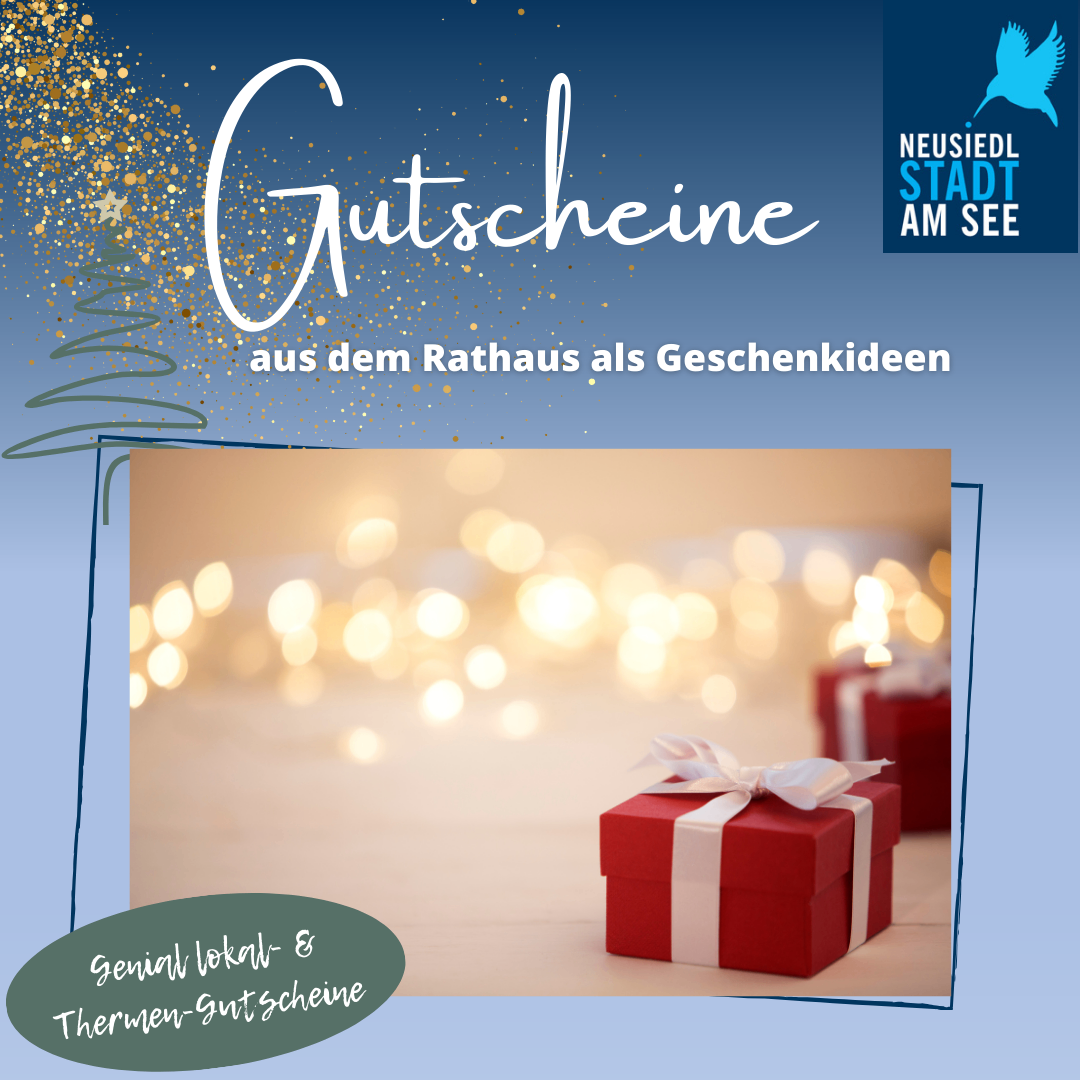 Ein Werbebild zeigt eine rote Geschenkbox mit einem weißen Band, vor einem unscharfen Hintergrund aus Bokeh-Lichtern. Der Text lautet 'Gutscheine aus dem Rathaus als Geschenkideen', was auf Geschenkideen aus dem Rathaus hinweist. Es gibt ein Logo mit einem blauen Vogel und 'Neusiedl am See'.