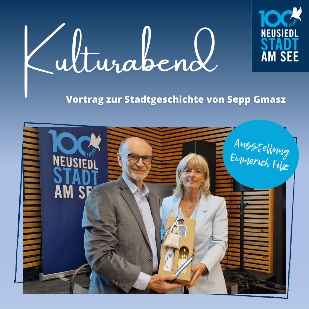 Ein Bild von zwei Personen, die eine Geschenkbox in einem Raum mit einer Holzwand und einem Banner mit Text präsentieren.