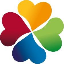 Das Logo der Volksschule Frauental zeigt eine farbenfrohe herzförmige Blume in der Mitte. Der Text 'Volksschule Frauental' steht in Schwarz.