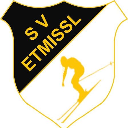 Ein schwarzes und gelbes Schildlogo mit dem Text SV ETMISSL und einer gelben Silhouette eines Skifahrers auf weißem Hintergrund.