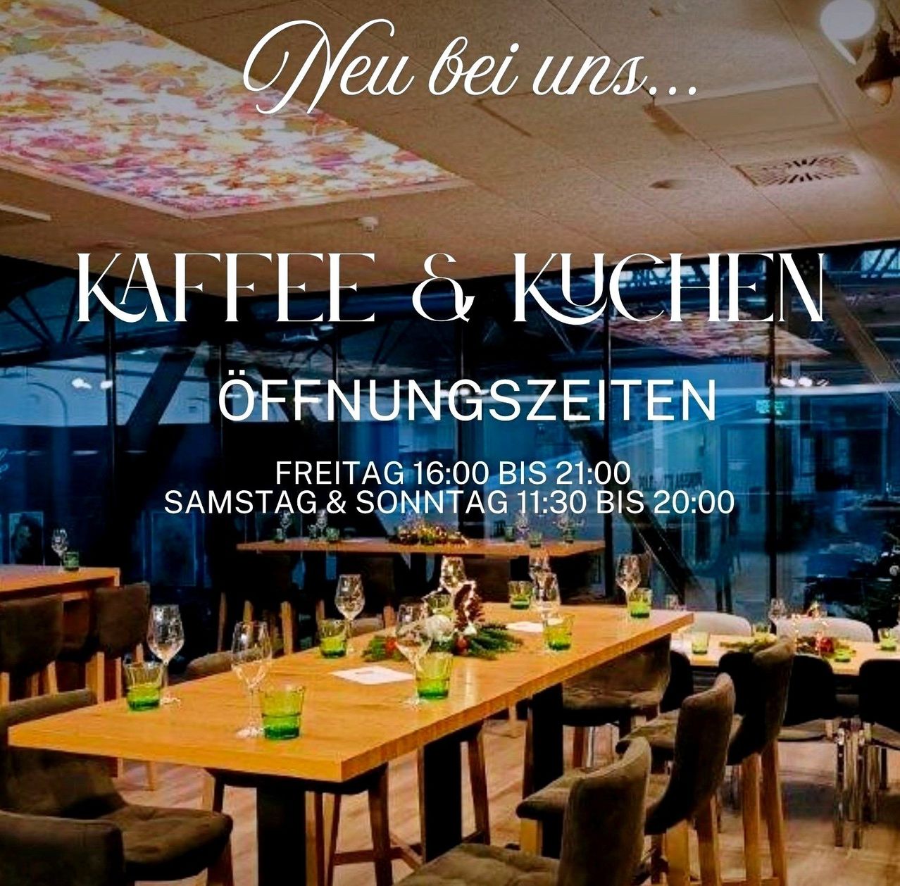 A restaurant with a table set for guests. It reads Kaffee & Kuchlen and provides opening times.