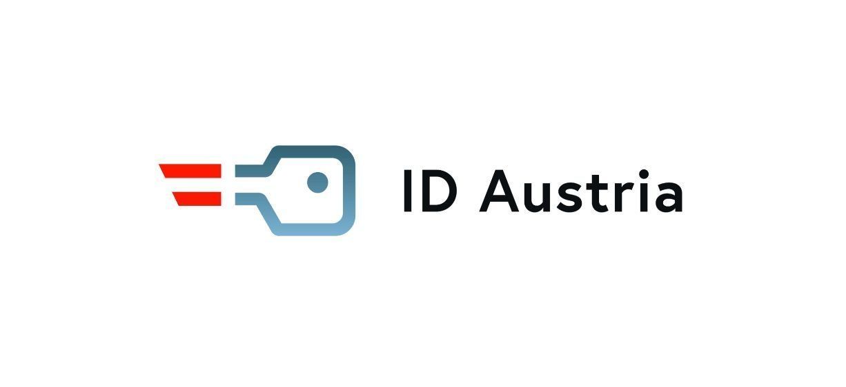 Das ID Austria Logo zeigt ein blaues Quadrat mit einem roten Streifen auf der linken Seite und einem grauen Kreis in der Mitte. Das Logo wird von den Worten ID Austria begleitet.