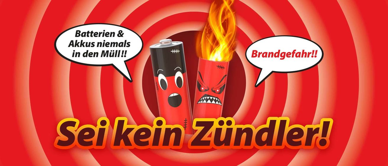 Zwei rote Batterien auf rotem Hintergrund, wobei eine in Flammen steht. Die linke Batterie hat ein trauriges Gesicht und den Text 'Männer & Tiere werden!'. Die rechte Batterie hat ein ärgerliches Gesicht und den Text 'Brand'. Darunter steht der Text 'kein Zünd'.