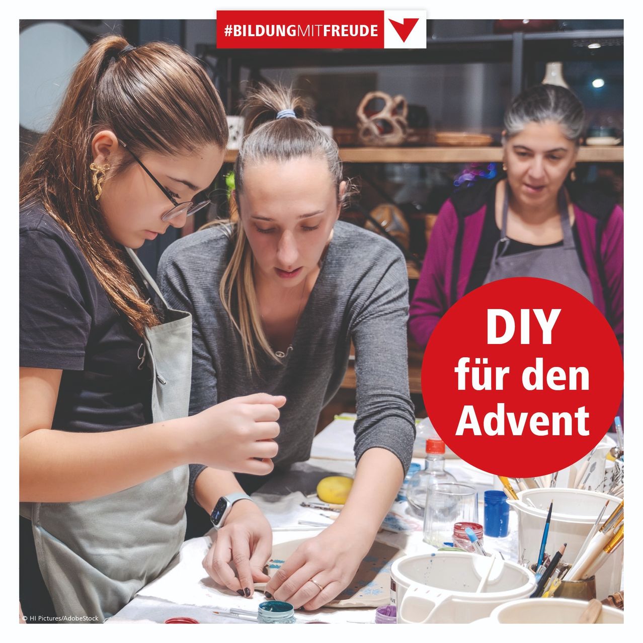 A group of women are crafting in a studio. Two of them are focused on an art project, while another watches them. Supplies like paint and brushes are on the table. The poster reads DIY for Advent.