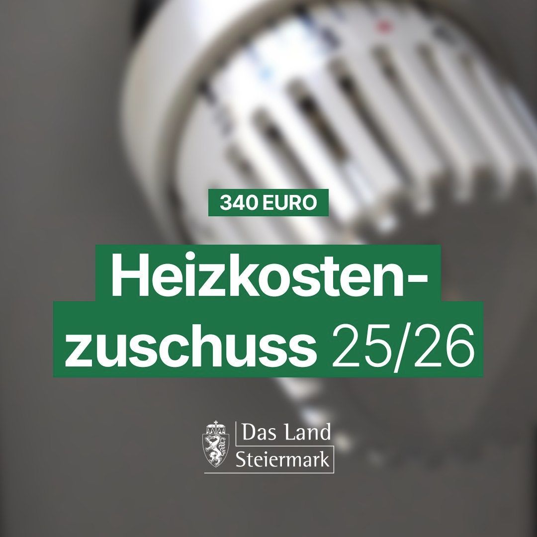 Ein weißer Heizkörper mit den Texten '340 EURO' und 'Heizkosten-zuschuss 25/26'. Das Bild ist unscharf und hat ein grünes und weißes Farbschema.