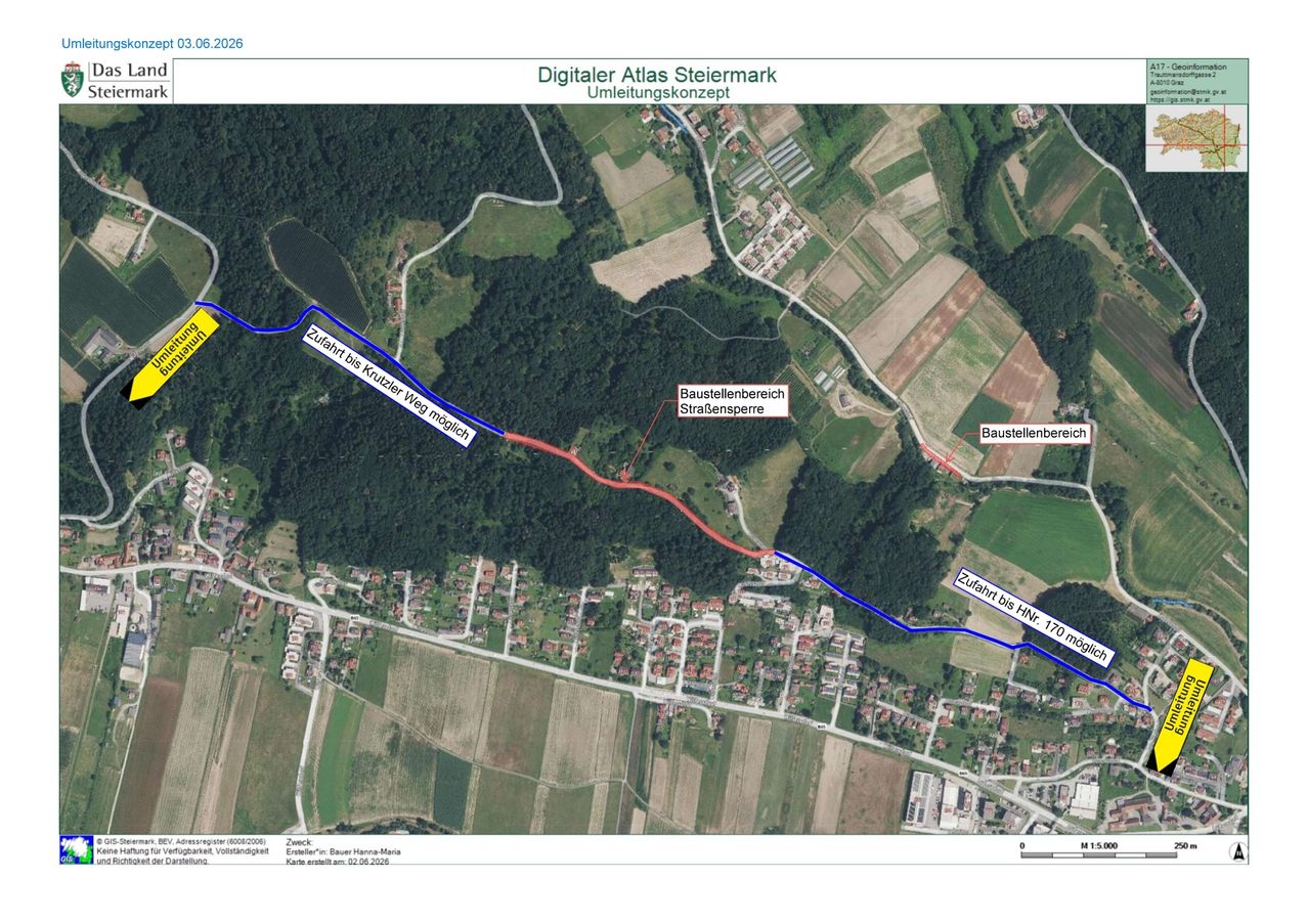 Luftbildkarte mit einem vorgeschlagenen Straßenverlauf mit zwei möglichen Zielen, eines führt zu einem Dorf und das andere zu einer Autobahn, mit verschiedenen benannten Wahrzeichen und Gebieten.