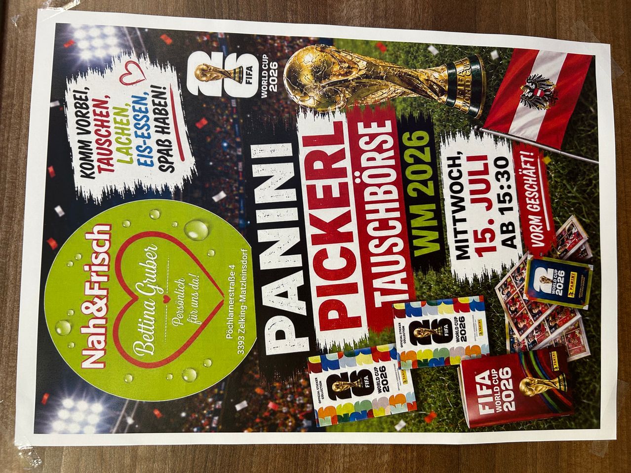 Poster featuring soccer trophies, a soccer ball, and a flag. Dates, times, and locations are displayed for a soccer event in 2026. A circular green label is at the bottom left.