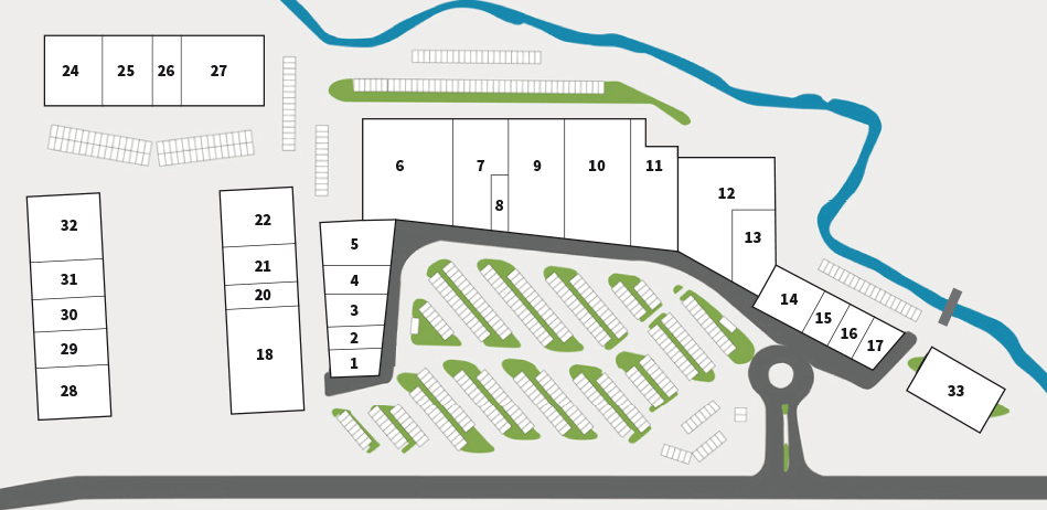 Ein Lageplan eines Parkplatzes, mit nummerierten Stellplätzen und zwei Durchgängen mit Treppenzugang. Der Plan ist in Abschnitte unterteilt.