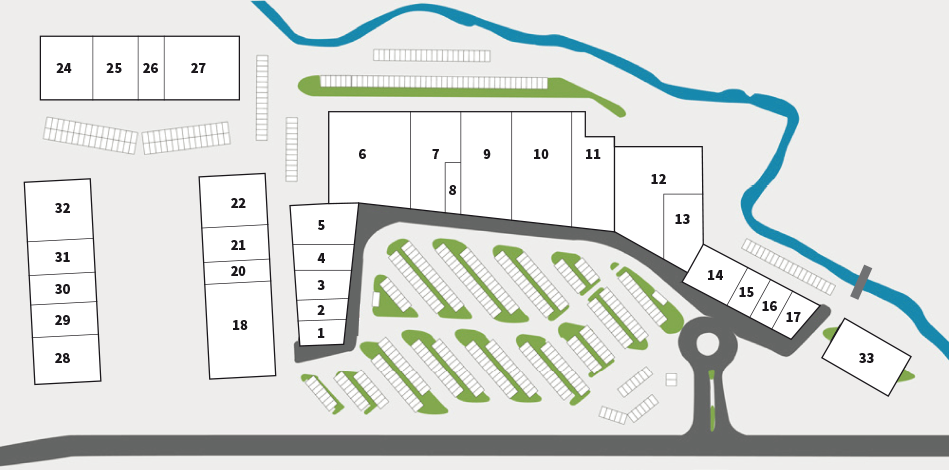 Ein Lageplan eines Parkplatzes, mit nummerierten Stellplätzen und zwei Durchgängen mit Treppenzugang. Der Plan ist in Abschnitte unterteilt.