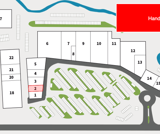 Ein Grundrissplan mit verschiedenen nummerierten Bereichen und einem beschrifteten Bereich, der als 'Handypartner' gekennzeichnet ist. Der Grundriss umfasst mehrere nummerierte Reihen und Spalten.