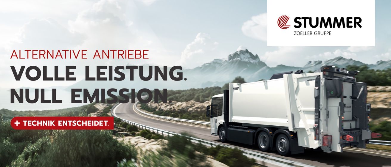 Ein Bild eines Lastwagens, der auf einer malerischen Bergstraße fährt, mit den Worten 'Antriebe, Leistung, Mission' prominent angezeigt.