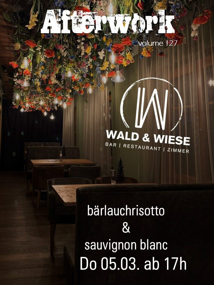 Ein Innenrestaurant mit Tischen und Stühlen, mit einer Blumendekoration und Lichtern. Der Name des Etablissements ist Wald & Wiese, das eine Bar, ein Restaurant und Zimmerservice anbietet.