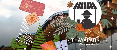 Eine festliche Weihnachtsmarktszene mit einem Verkaufsstand, Geschenken und dekorativen Elementen wie Weihnachtsbäumen und Kränzen. Das Wort 'THAYAPARK' ist prominent dargestellt.