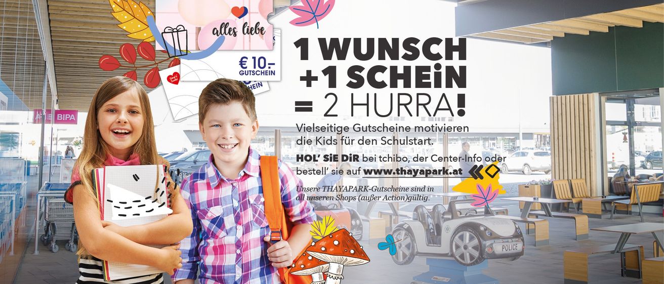 A poster advertising a shopping center with a smiling boy holding a backpack. The poster includes a slogan '1 WISH + 1 COIN = 2 HURRA!' and mentions vouchers for the school start.