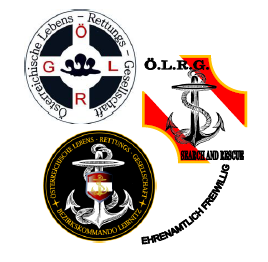 Drei Embleme werden angezeigt: ein rundes Emblem mit den Buchstaben GRL, ein Schild mit einem Anker und dem Text O.L.R.G. und ein kreisförmiges Emblem mit einem Anker, einem Schild und den Worten 'Ehrenamtl. Freiw.' in der Mitte.