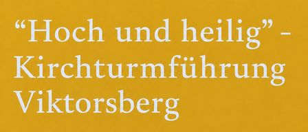 A yellow poster advertises a church tower tour in Viktorsberg. It includes a meeting time, location, and a description of the event.