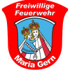 Das Logo der Freiwilligen Feuerwehr Maria Gern zeigt ein Wappen mit zwei gekrönten Figuren, wobei eine größer als die andere ist, mit einem Kreuz auf dem Kopf der größeren Figur. Unter dem Wappen stehen die Worte 'Maria Gern' geschrieben.