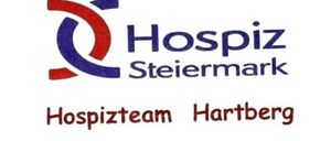 Das Bild zeigt das Logo für Hospiz Steiermark, ein Hospizteam in Hartberg. Das Logo enthält ein rotes und blaues kreisförmiges Symbol mit dem Wort 'Hospiz' in Blau. Darunter steht 'Steiermark' in Blau und 'Hospizteam Hartberg' in Rot geschrieben.