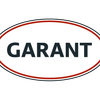 Ein Logo für Garant wird auf schwarzem Hintergrund angezeigt. Das Logo zeigt eine weiße Ellipse mit roten Kanten und dem Wort Garant in Schwarz geschrieben.