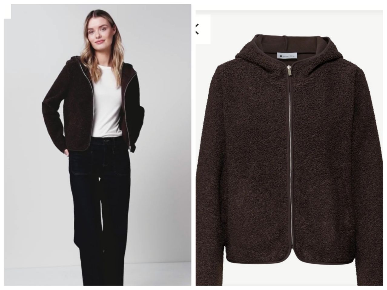 A woman wearing a brown jacket with a hood and black pants is standing. The jacket is with a zipper and has a white tag on the left side.