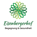Das Eisenbergerhof-Logo zeigt ein grünes, blumeähnliches Design mit den Worten 'Eisenbergerhof' und 'Begegnung & Gesundheit' darunter.
