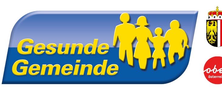 Das Logo für 'Gesunde Gemeinden' zeigt ein blau-gelbes Design mit einer Familiensilhouette, einer Krone und dem Text 'Gesunde Gemeinden'. Die Krone steht für Österreich, und 'Gesunde Gemeinden' bedeutet 'Gesunde Gemeinden'.