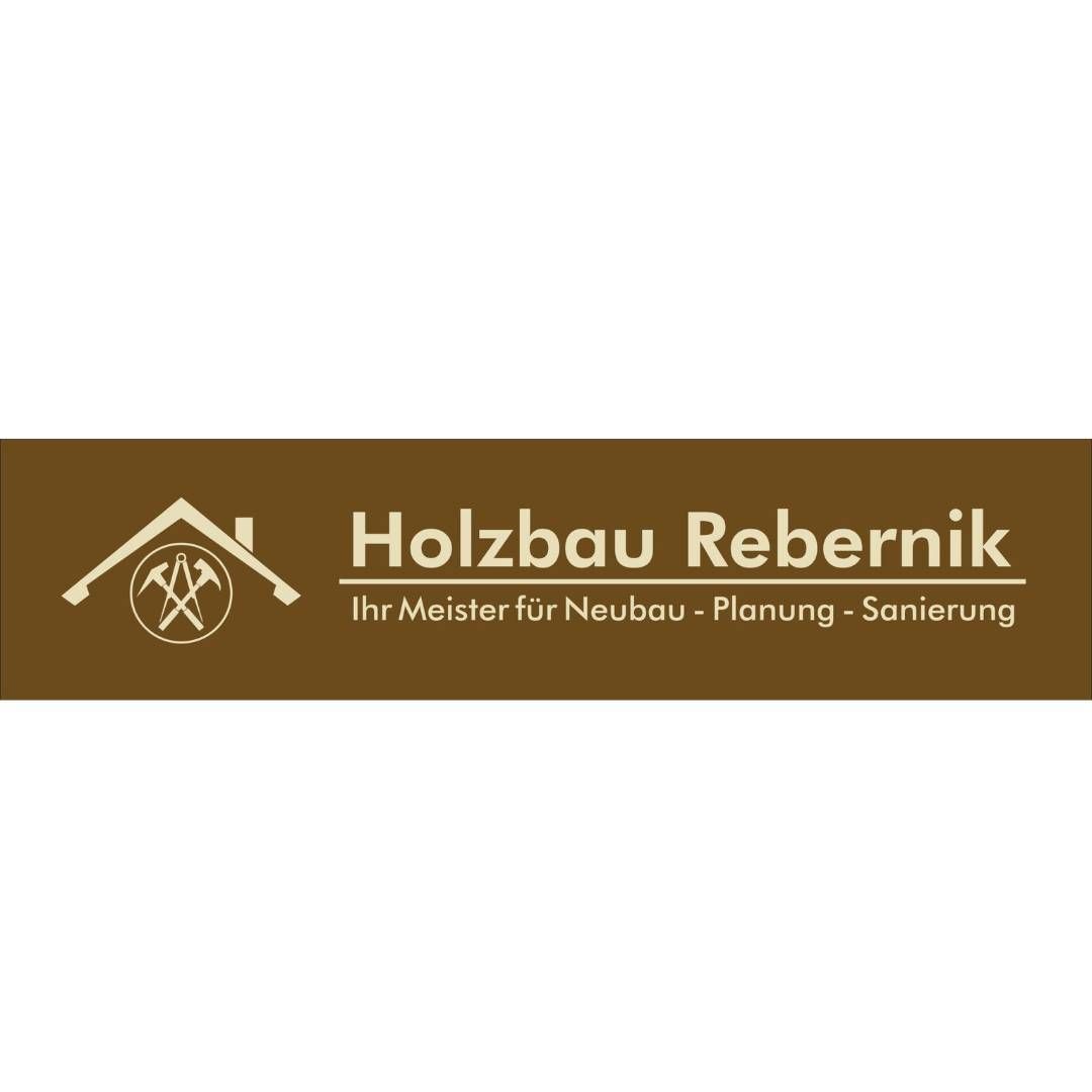 Logo of Holzbau Rebernik, a carpentry and construction company. It features a house, hammers, and the company name.