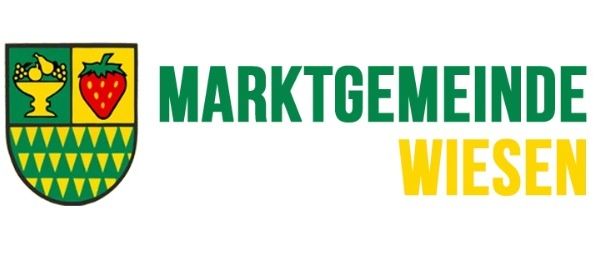 Das Logo der Wiesener Marktgemeinde zeigt einen Schild mit grünen und gelben Mustern, einer Erdbeere und einer Schale mit Früchten. Darunter stehen die Worte 'MARKTGEMEINDE WIESEN'.