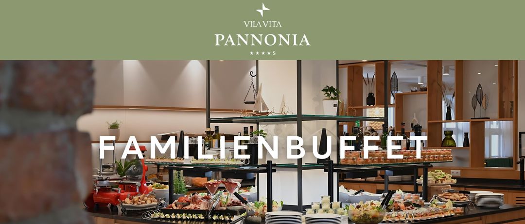 Ein Buffettisch mit einer Vielzahl von Lebensmitteln, Fleisch und Gemüse, darunter Salate, Brot und Wein.