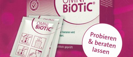 Plakat für Omni Biotic Probiotika, zeigt Produktverpackung, Beutel und ruft zum Probieren und Beraten in der Apotheke auf.