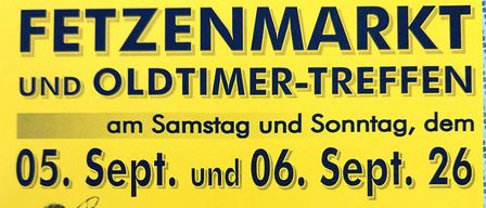Ein gelbes Plakat, das für einen Fettenmarkt und Oldtimer-Treffen am 05. und 06. September 2026 wirbt. Es enthält Details zu den Veranstaltungszeiten und dem Ort.