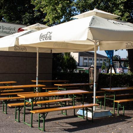 Image contains, Bench, Furniture, House, Housing, Patio, Patio Umbrella, Restaurant, Cafeteria, Canopy, Wood